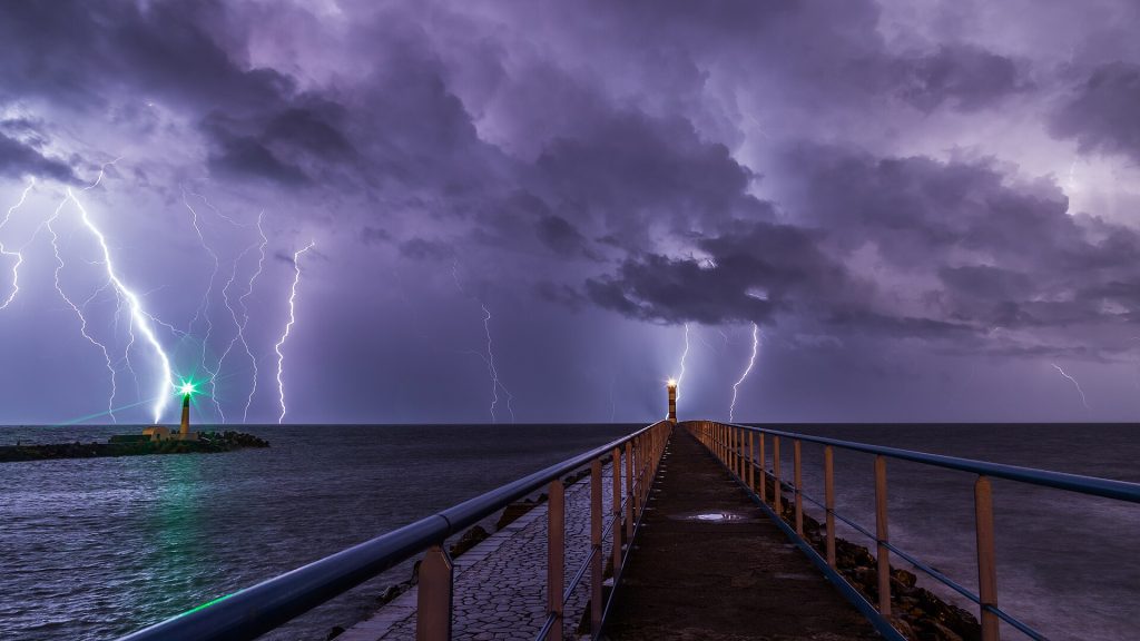 AI Weather Models Are Beating the Physics Giants at Their Own Game Dark storm clouds building over a landscape